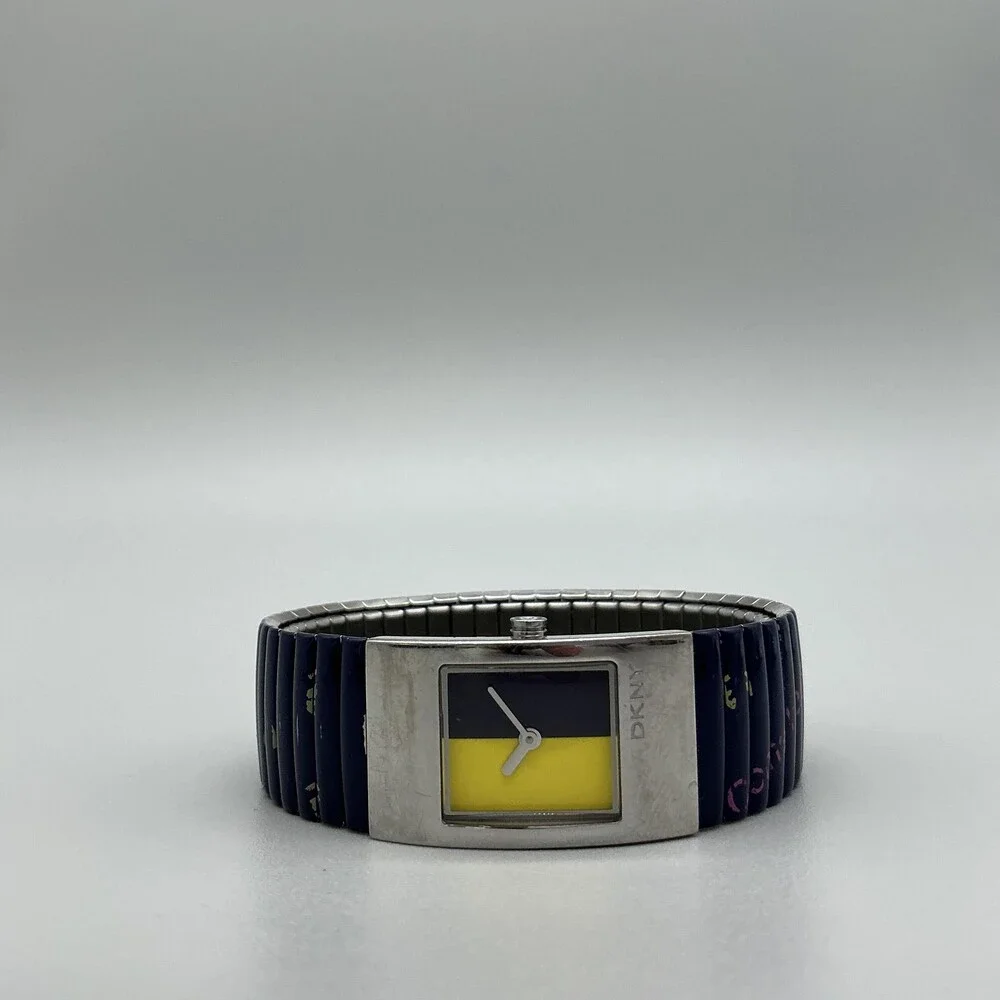 DKNY Womens Watch 19mm Silver Tone Multicolor Dial Blue Stretch Band New Battery